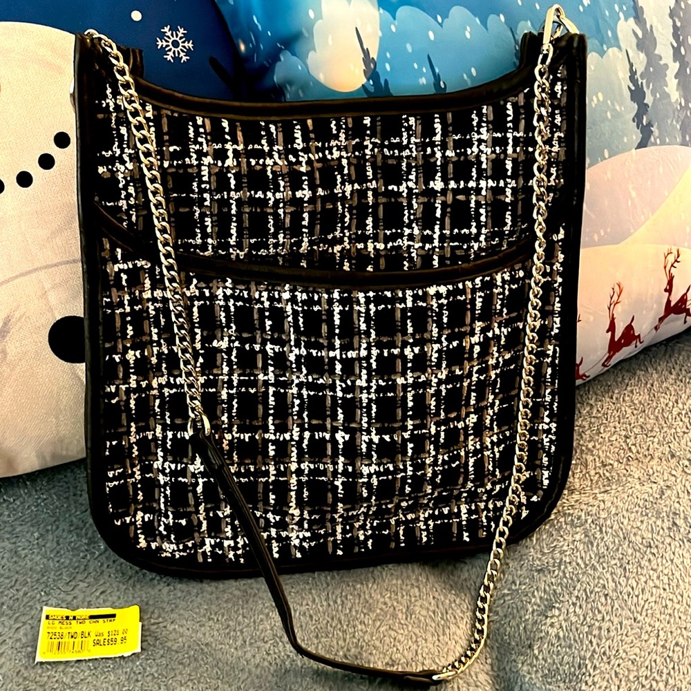 This is a stylish new black, gray, and white pattern tote from Shoes and More.
